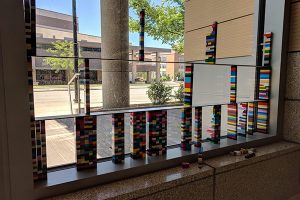 Lego stacks inside a window
