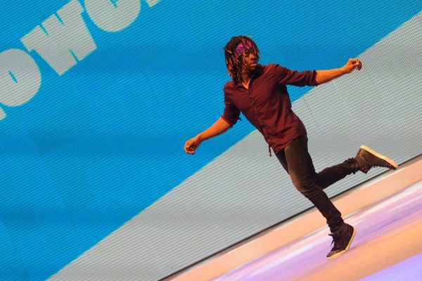 Omari dancing with one foot up