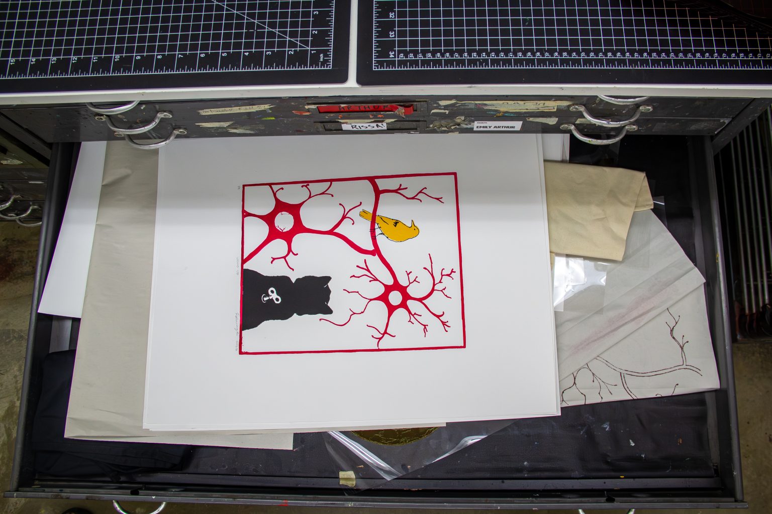 Neurons and animals depicted in one of Savage’s prints. Photo by Ted Hyngstrom